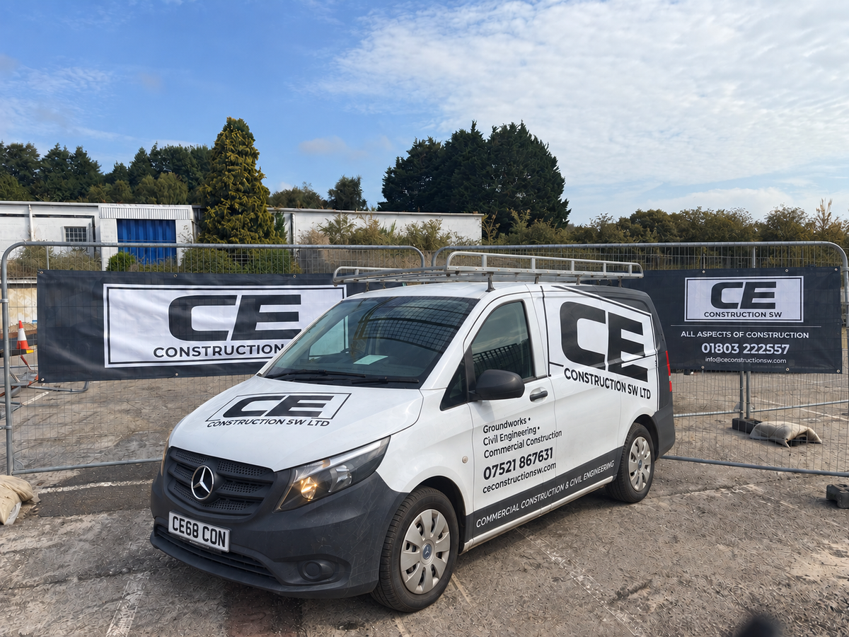 CE Construction SW van and site banners on a groundworks site